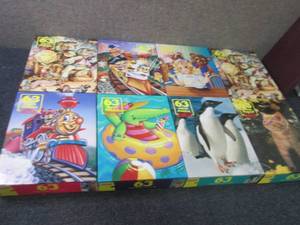8 Sealed 63 piece Hoyle Puzzles...