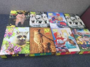 8 Sealed 63 piece Hoyle Puzzles...