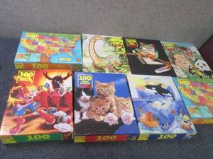 8 Sealed 100 piece Hoyle Puzzles...