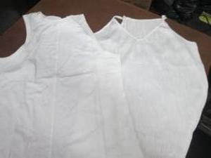2 Off White Tanks...
