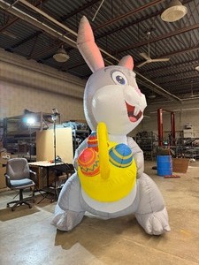 lot 1E image: 13 Airblown Inflatable Easter Bunny
