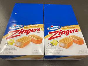 lot 16 image: Set of 2 Boxes of Hostess Iced Vanilla Zingers