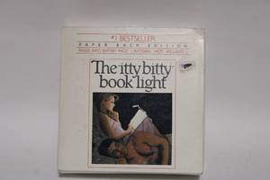 lot 48 image: The Itty Bitty Book Light by Zelco - Paperback Edition