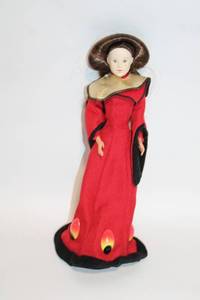 lot 63 image: Vintage Doll in Red Gown with Unique Hair Style