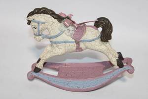 lot 111 image: Vintage Carved Rocking Horse Figurine with Ribbon