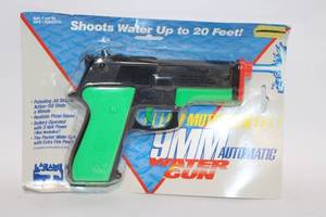 lot 240 image: Vintage Larami 9MM Automatic Water Gun in Original Packaging