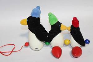 lot 301 image: Colorful Pull-Along Penguin Toy Set