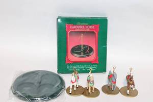 lot 306 image: Collection of 4 1989 Hallmark Carousel Horse Ornaments with Display Stand