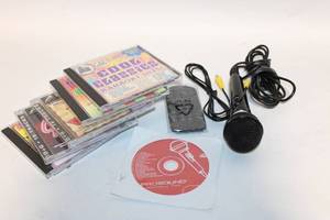 lot 416 image: ProSound Karaoke System with Microphone, Remote, and 6 Karaoke CD Sets