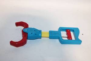 lot 425 image: Vintage Toy Grabber Arm - Red and Blue