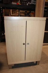 lot 492 image: Wooden Storage Cabinet with Wheels and Adjustable Shelves