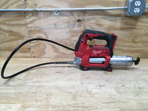 lot 21 image: Milwaukee Grease Gun Model # 2646-20 - Tool Only