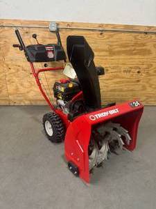 lot 12 image: TROY-BILT Storm 24in 208 cc Two-Stage Gas Snow Blower