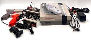 Nintendo Entertainment System with Controllers and Zapper Guns