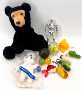 lot 423 image: Mixed Lot of Vintage Toys Including Bear, Pillsbury Doughboy, and Terminator Figure