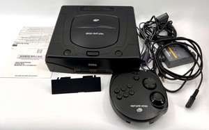 lot 606 image: Sega Saturn Console with 3D Control Pad and Accessories
