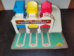 lot 11 image: Vintage Fisher Price Little People Dump Truckers Toy