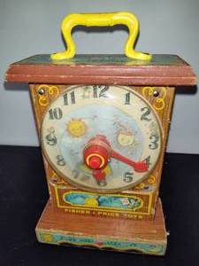lot 20 image: Vintage Fisher Price Music Box Teaching Clock