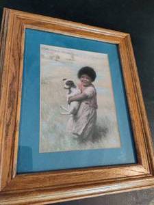 lot 65 image: Framed Girl Holding Dog Artwork