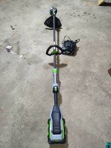 lot 203 image: Ego Battery Powered Weed Wacker