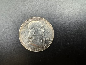lot 53 image: 1949 BU Silver Franklin Half Dollar From Complete set