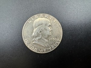 lot 56 image: 1950 BU Silver Franklin Half Dollar From Complete set