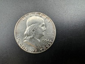 lot 67 image: 1954 BU Silver Franklin Half Dollar From Complete set