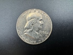 lot 74 image: 1958 BU Silver Franklin Half Dollar From Complete set