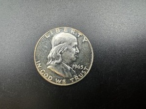 lot 84 image: 1963 BU Silver Franklin Half Dollar From Complete set