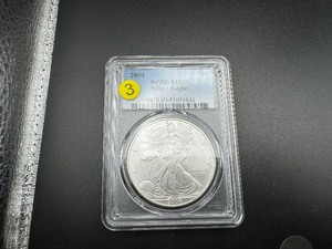 lot 3 image: 2004 1 Oz. Silver American Eagle PCGS MS69