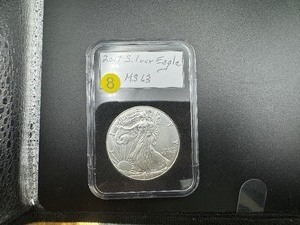 lot 8 image: 2017 1 Oz. Silver American Eagle Marked MS63