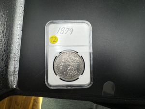 lot 12 image: 1879 Morgan Silver Dollar