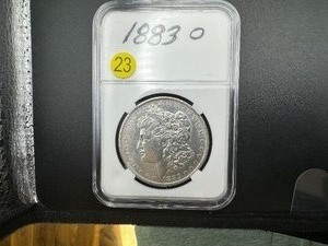 lot 23 image: 1883-O Morgan Silver Dollar