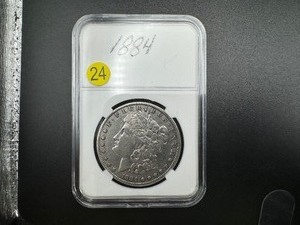 lot 24 image: 1884 Morgan Silver Dollar