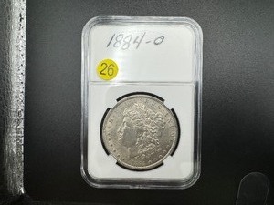 lot 26 image: 1884-O Morgan Silver Dollar