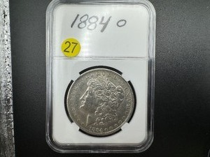 lot 27 image: 1884-O Morgan Silver Dollar