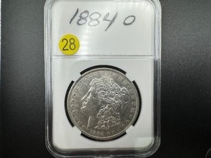 lot 28 image: 1884-O Morgan Silver Dollar