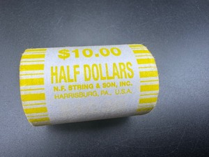 lot 99 image: Unopened Fed Roll Kennedy Half Dollars