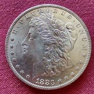 lot 18 image: Beautiful 1883-O Morgan Dollar