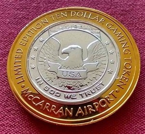 lot 26 image: McCarran Airport Las Vegas Silver Strike $10 Gaming Token