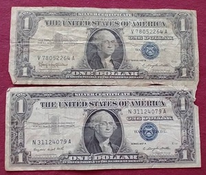 lot 59 image: (2) 1957 Silver Certificate $1 Notes