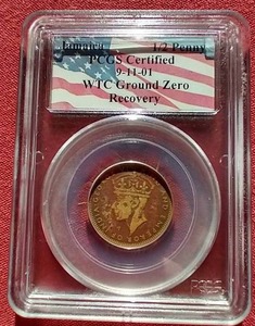 lot 91 image: PCGS Certified 911 World Trade Center Ground Zero Recovered Coin