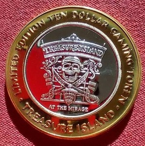 lot 97 image: Treasure Island Las Vegas Silver Strike $10 Gaming Token