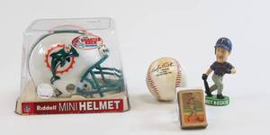 lot 30 image: Vintage Sports Memorabilia Lot - Dolphins Helmet, Replica Babe Ruth Signed Ball