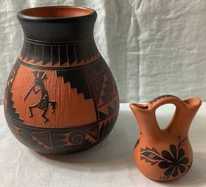 lot 26 image: Singer Navajo Pottery Black Terracotta Carved Vase and Native American Pottery Wedding Vase