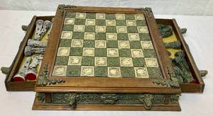 lot 161 image: Mayan vs. Aztec Carved Chess Set