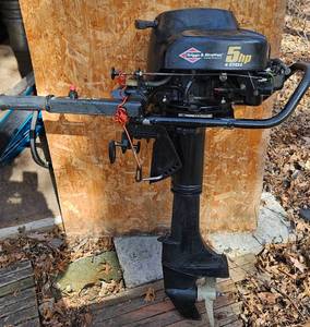 lot 15 image: Briggs & Stratton Power Products 5HP 4 cycle Outboard MotorKicker