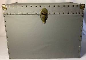 lot 218 image: Wooden Trunk covered in grey fabric with brass accents