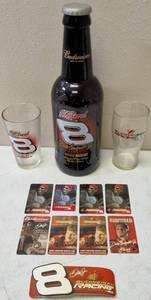lot 35 image: Budweiser  Dale Earnhardt Jr. Memorabilia (1) 2000 NASCAR Bank (2) Commemorative Glasses (8) Collectible Cards (View Photos)