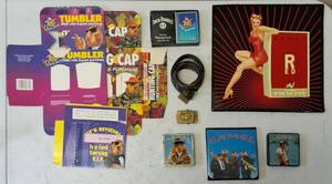 lot 44 image: Camel  Joe Cool Memorabilia From an Estate - Belt Buckle, Playing Cards & More  Bonus Jack Daniels Playing Cards (View Photo)